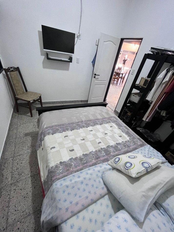 LOCAL TRANFORMADO A VIVIENDA